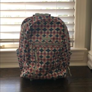 A Vera Bradley rolling backpack
